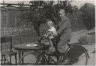 1947 Koos en Ton van Rijn op een fiets in de tuin